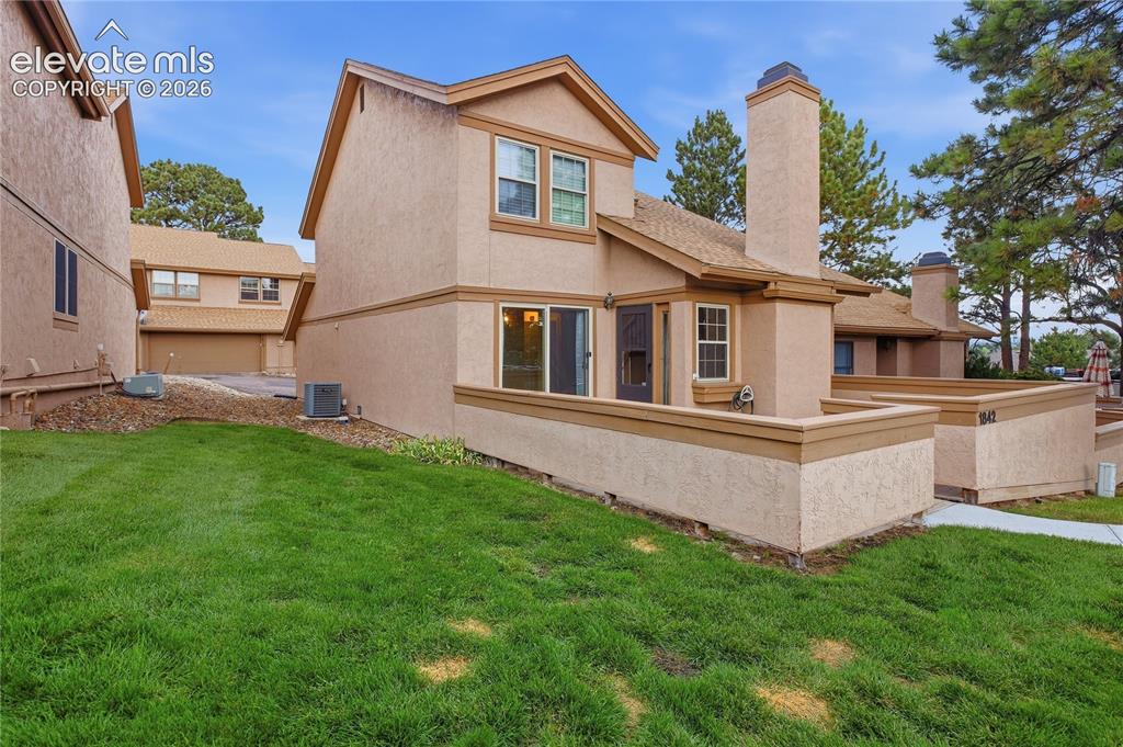 Image 2 of 35: Stucco exterior 