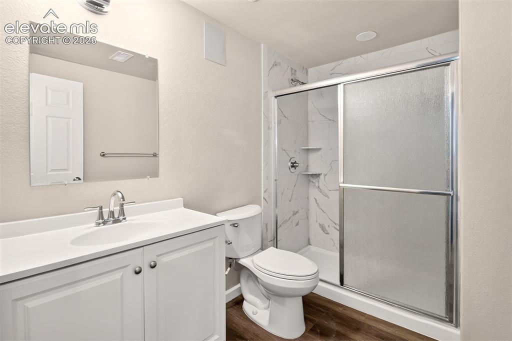 Image 45 of 50: Shared bath basement