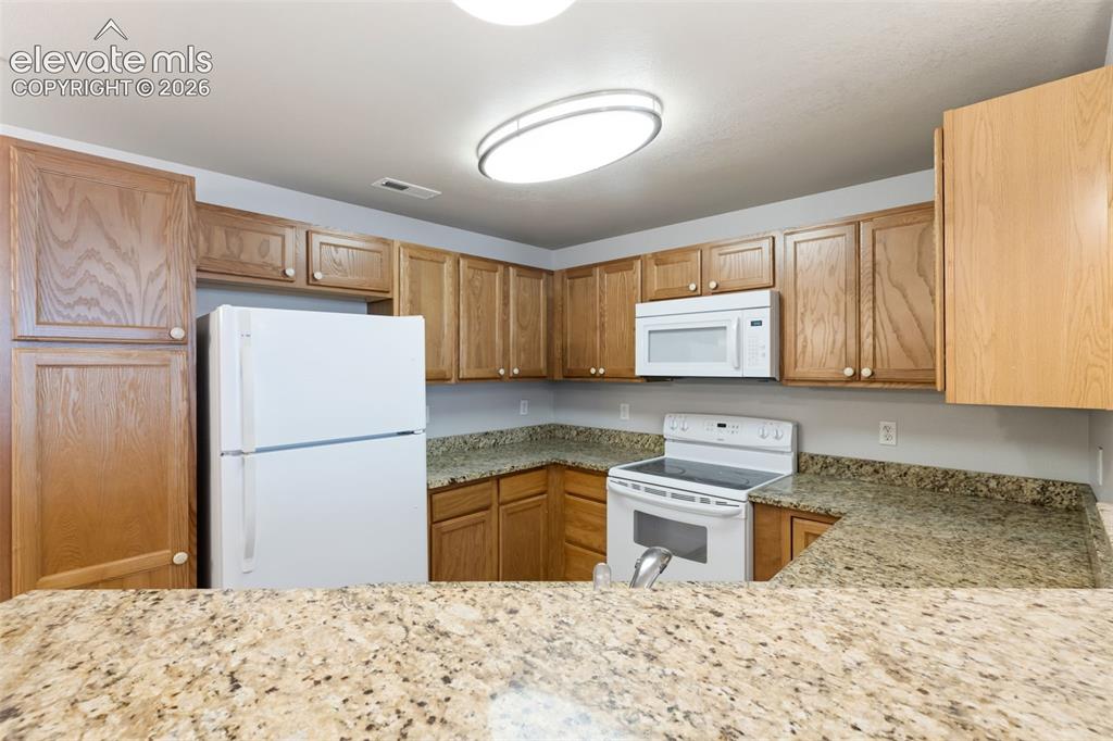 Image 12 of 28: Kitchen