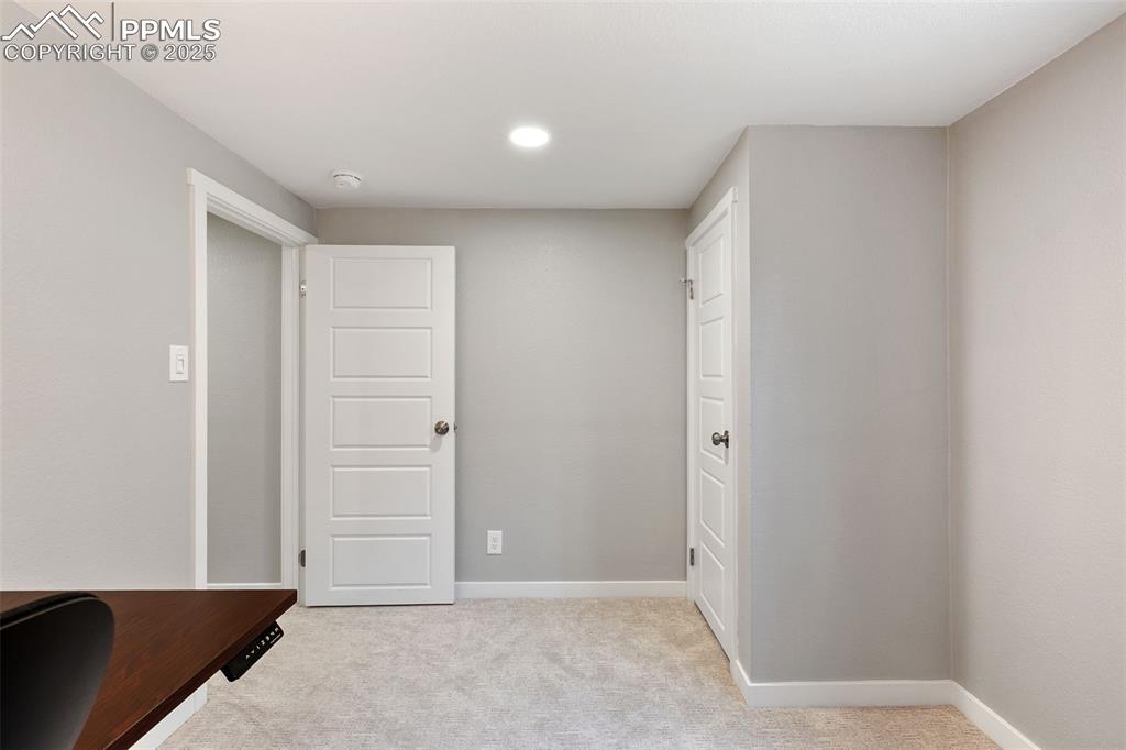 Image 30 of 37: Unfurnished office with light colored carpet and recessed lighting