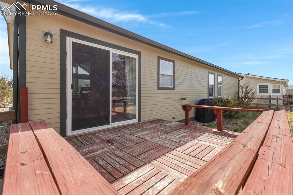 Image 24 of 24: View of wooden deck