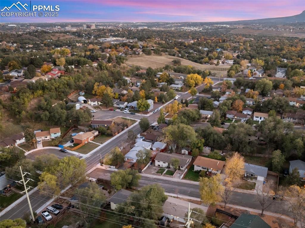 Image 8 of 47: Aerial view at dusk of a residential view