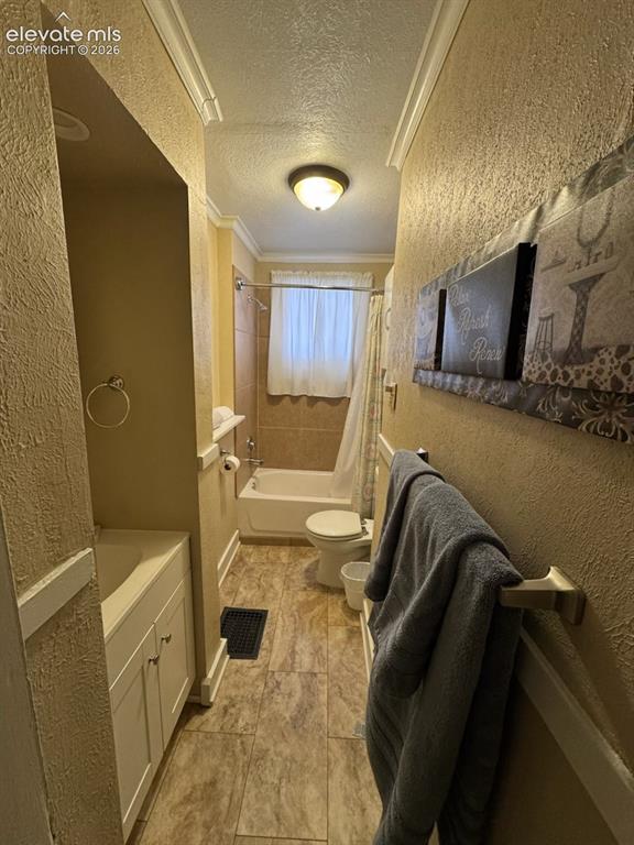 Image 9 of 27: Full bathroom featuring a single vanity, crown molding, a built-in tub with
