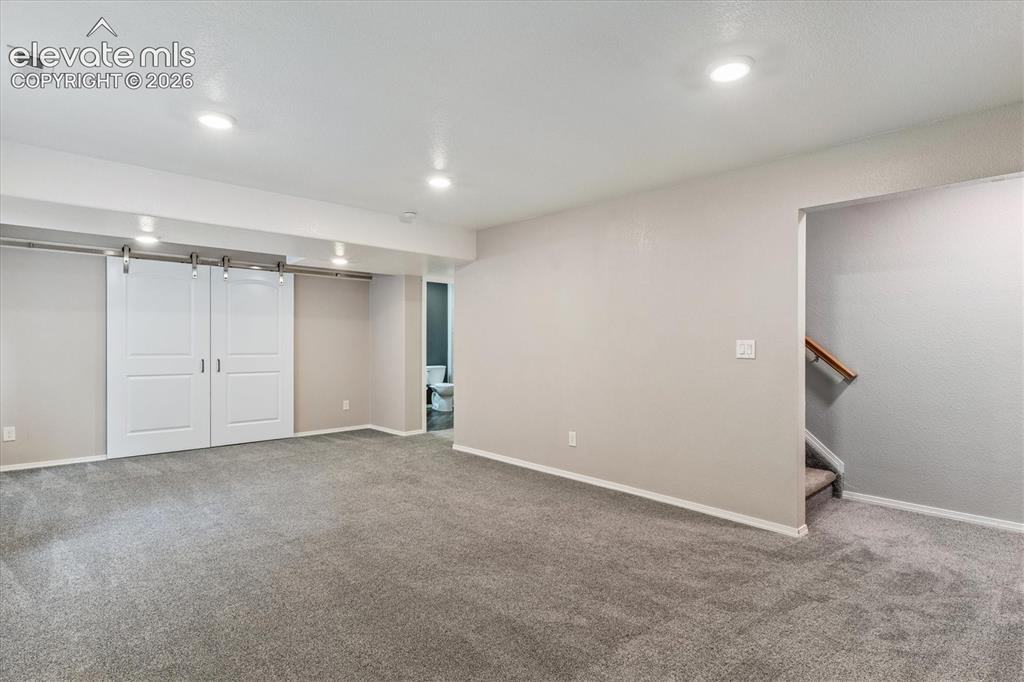Image 32 of 46: Spacious basement family room