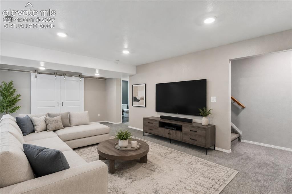 Image 33 of 46: Basement virtually staged for inspiration