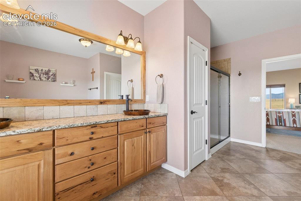 Image 22 of 48: Linen Closet and Roomy Walk In Shower!