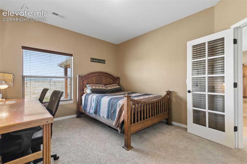 Image 24 of 48: 1 of 3 Additional Bedrooms, This One Easily Doubles as an Office!