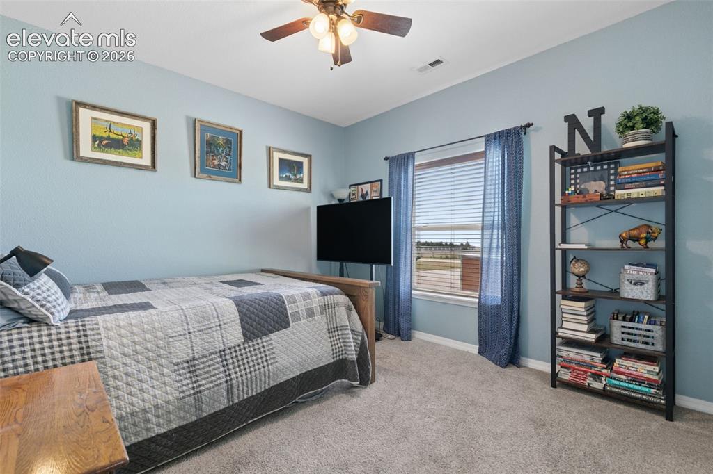 Image 28 of 48: 2nd of 3 Additional Bedrooms with Walk-in Closet and Ceiling Fan!