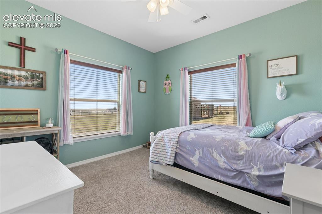 Image 30 of 48: 3rd Bedroom with Corner Windows for the Views!