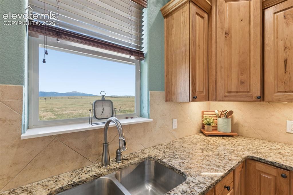 Image 8 of 48: Great Views from the Kitchen Window!