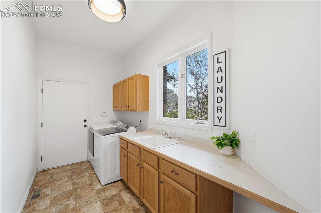 Image 31 of 47: Laundry/Mudroom off of garage