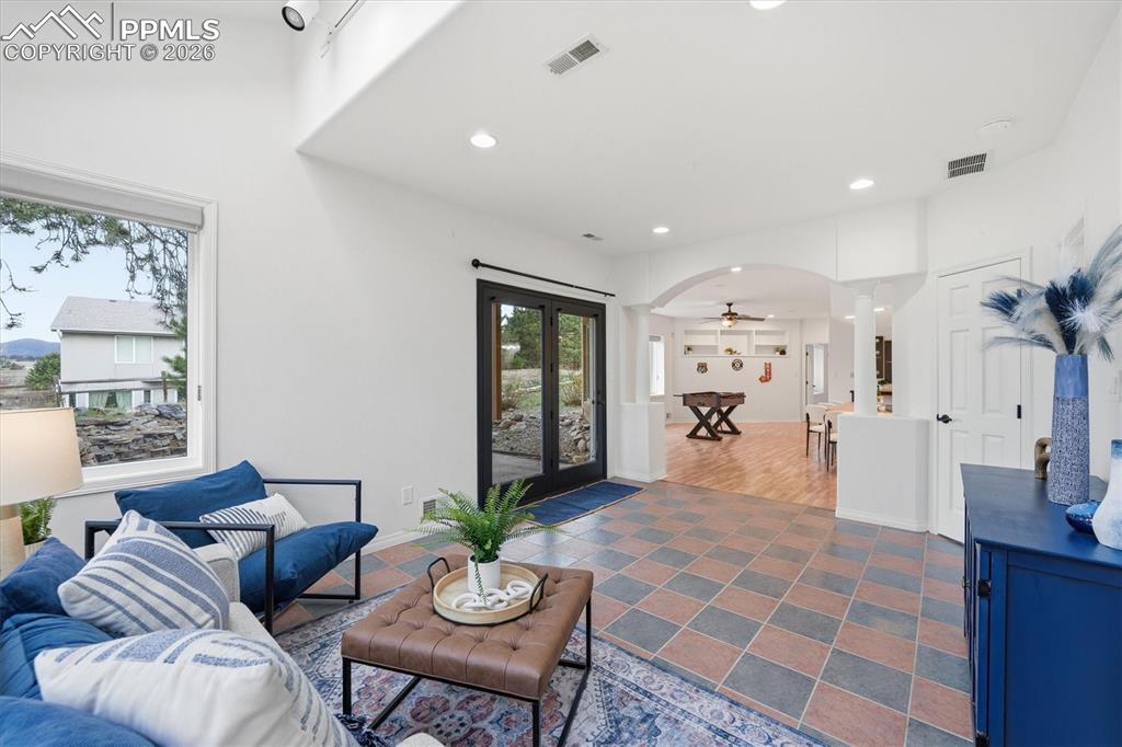 Image 33 of 47: Sun Room in Basement looking back at the Rec Room