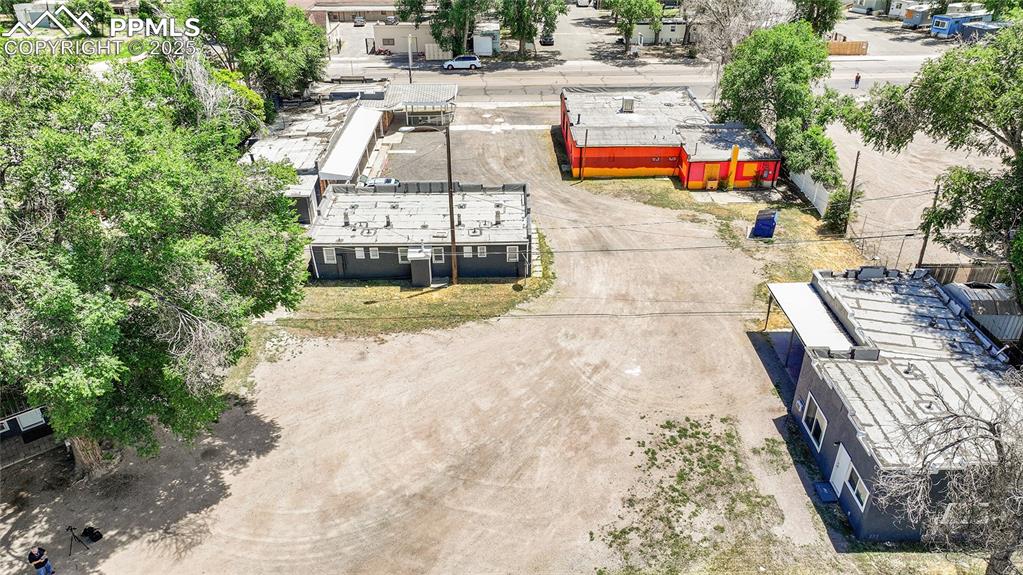 Image 27 of 32: Aerial view of property and surrounding area