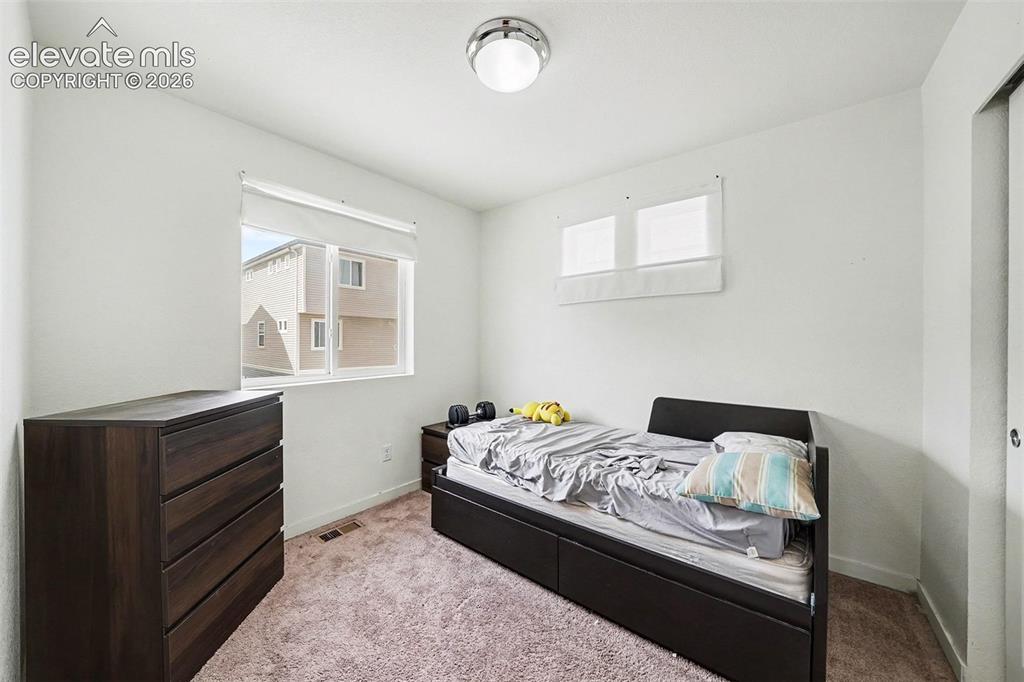 Image 12 of 17: Bedroom