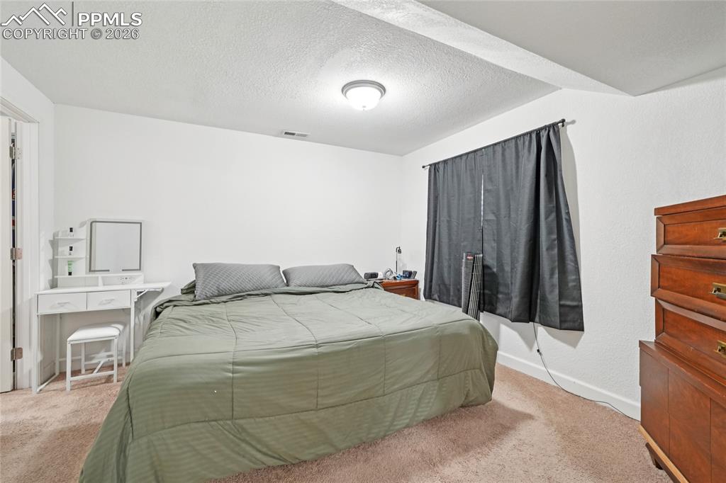 Image 18 of 39: Bedroom