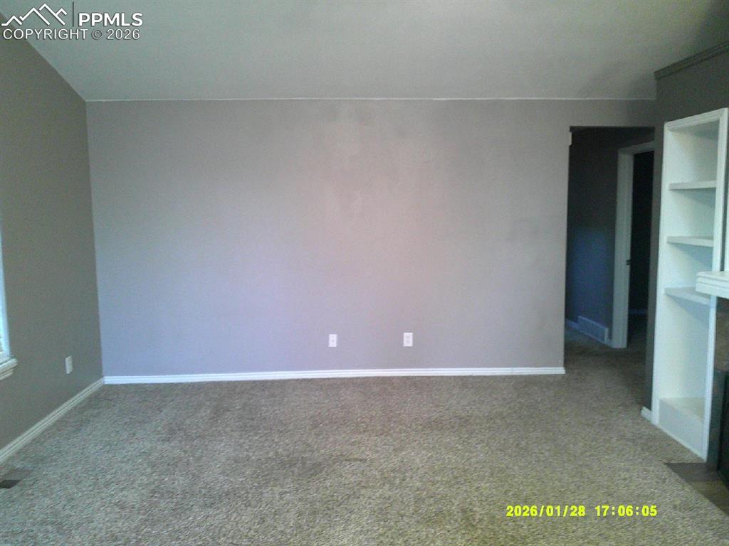 Image 6 of 22: Unfurnished bedroom with carpet flooring