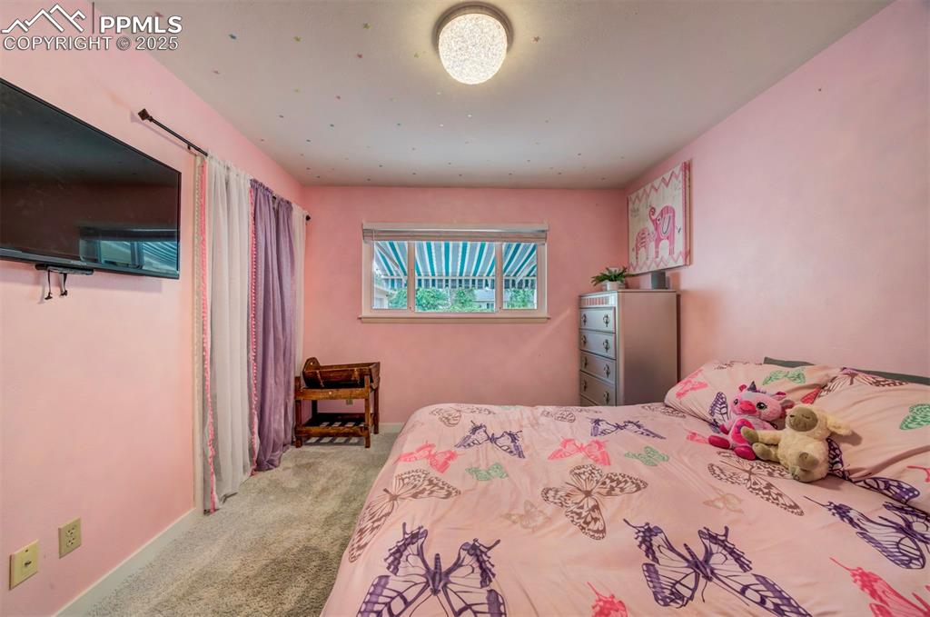 Image 24 of 32: Bedroom with carpet 