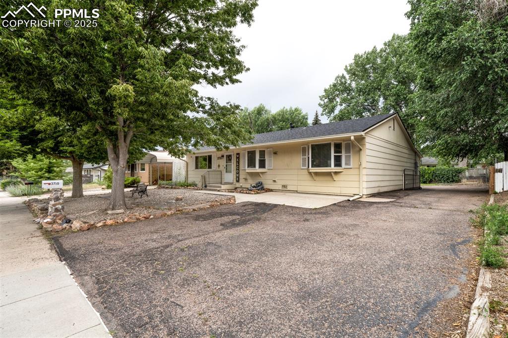 Image 28 of 32: Single story home showing ample parking space