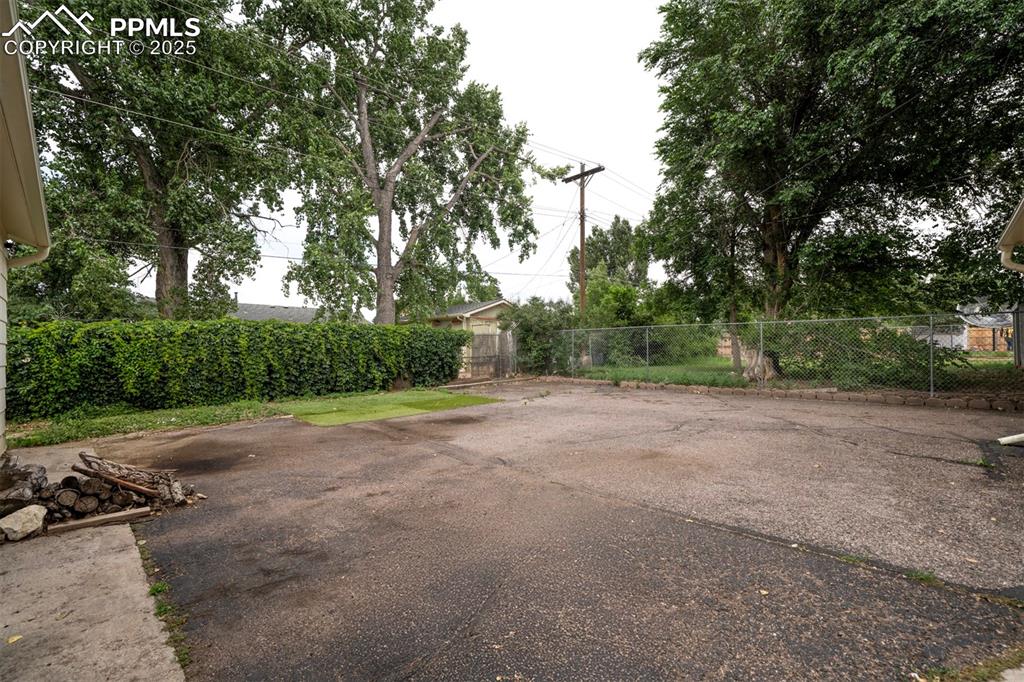 Image 31 of 32: Plenty of room for RV parking at back of home
