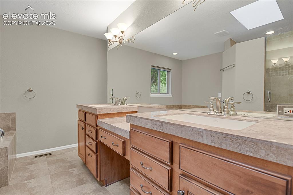 Image 30 of 50: Master Bathroom