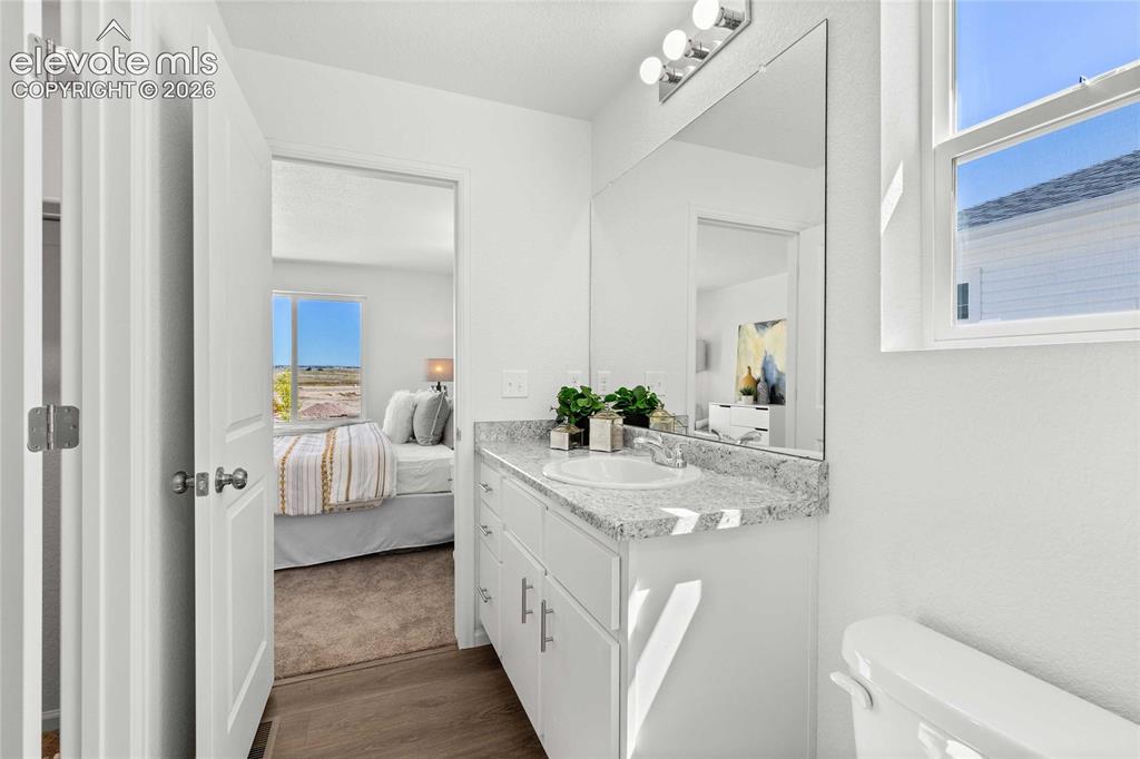 Image 17 of 30: White vanity with an integrated sink and light-colored countertop
*photos 