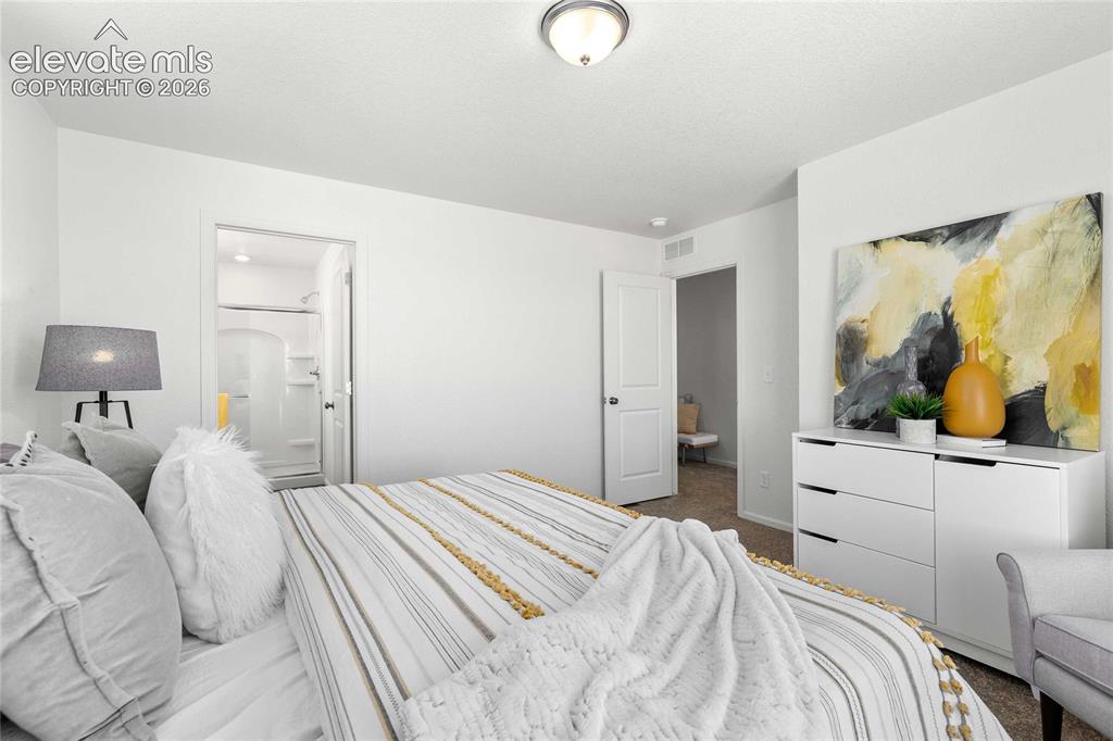 Image 21 of 30: White interior walls with a flush-mount ceiling light
*photos of a model