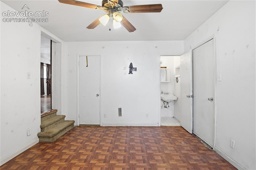 Image 21 of 36: PRIMARY BEDROOM ADJOINS A BATHROOM AND ALSO OFFERS PRIVATE ACCESS TO THE BA