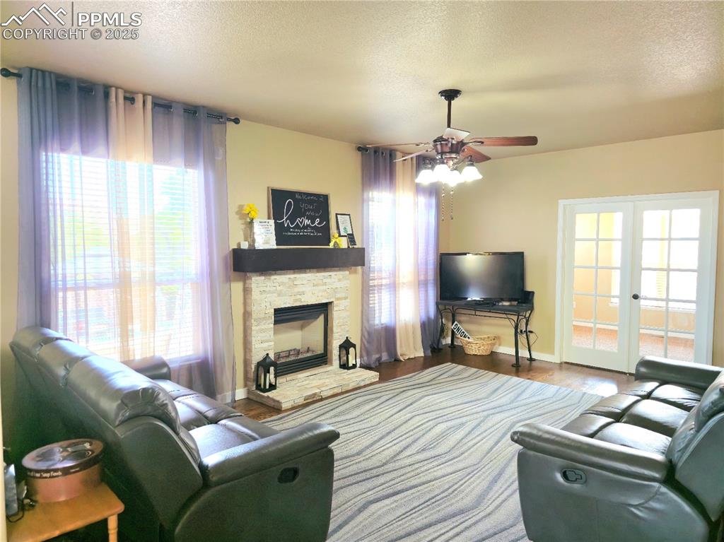 Image 13 of 48: Dining area featuring wood finished floors and baseboards