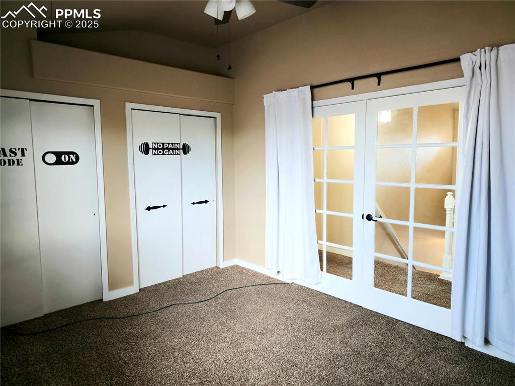 Image 27 of 48: 2nd floor Unfurnished bedroom 1 with two closets, vaulted ceiling, carpet,