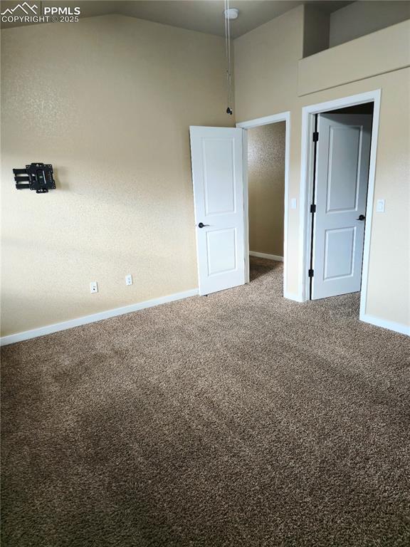 Image 31 of 48: 2nd floor Unfurnished bedroom 3 with walk in closest, window bench, vaulted