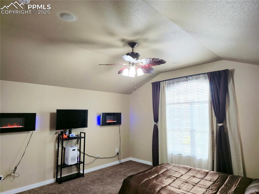 Image 32 of 48: 2nd floor Unfurnished bedroom 3 with walk in closest, window bench, vaulted