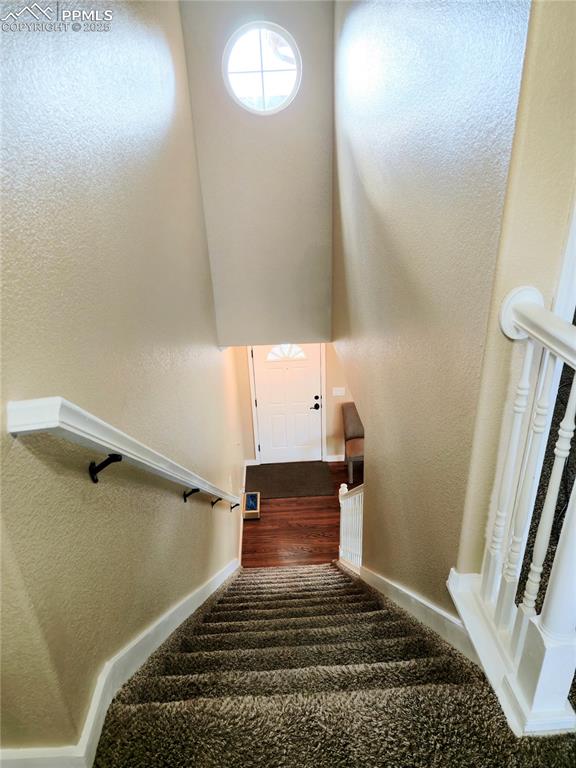 Image 37 of 48: Full bathroom with two vanities and tile patterned floors