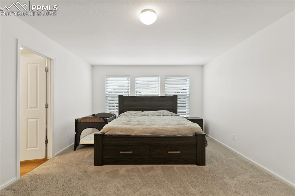 Image 21 of 38: Bedroom