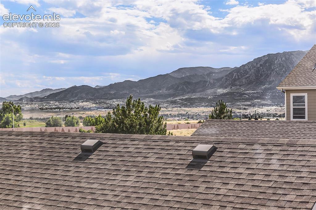 Image 14 of 24: View of mountain range from primary bedroom