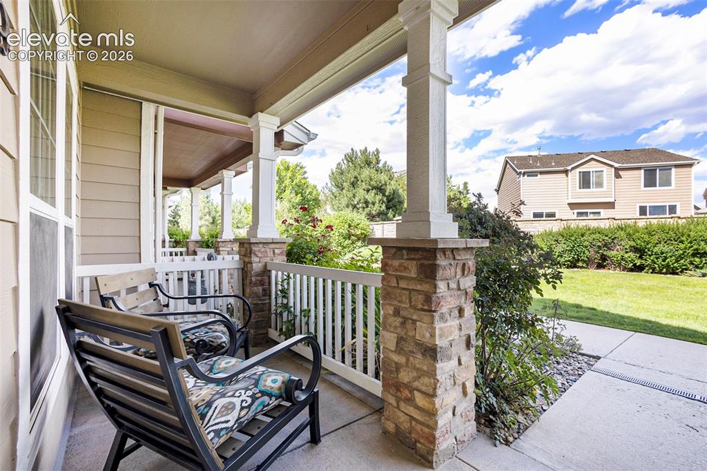 Image 3 of 24: Front porch to enjoy a cup of coffee or adult beverage