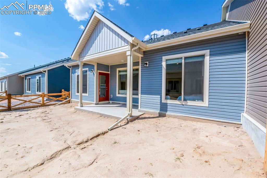 Image 8 of 28: Rear view of property with a patio area