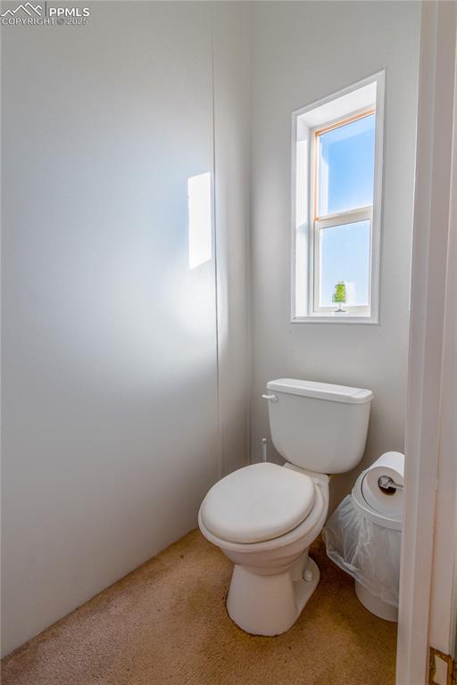 Image 30 of 34: toilet closet in primary bathroom