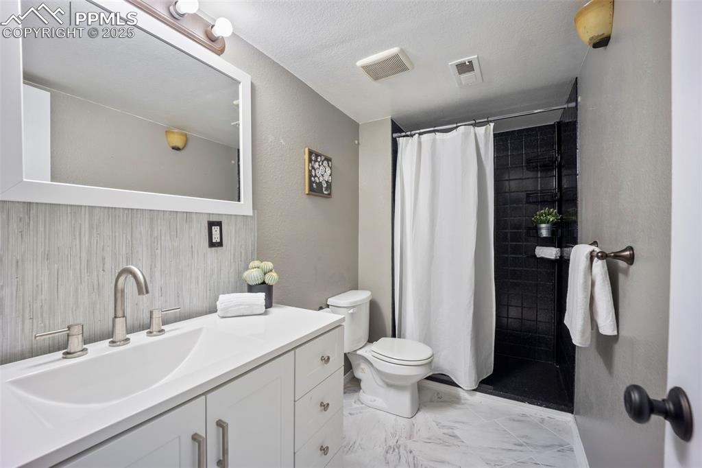 Image 37 of 50: Guest Bathroom in Basement