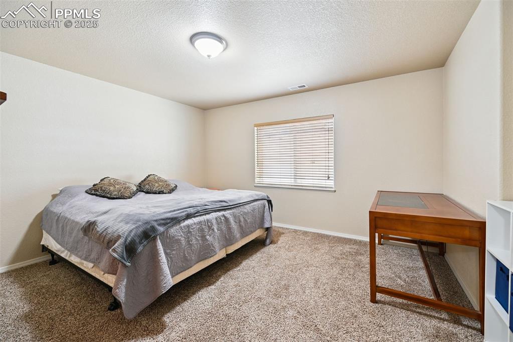 Image 35 of 45: Basement bedroo m