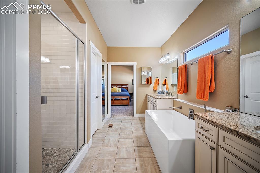 Image 20 of 50: Master Bathroom