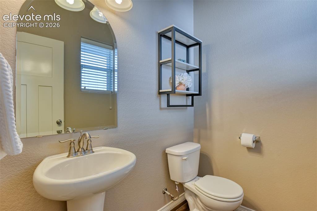 Image 29 of 45: 1/2 bathroom in main level