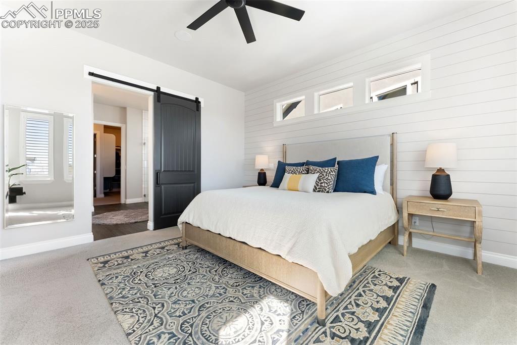 Image 20 of 50: New ceiling fan here and in the living room. Continue into the primary bath