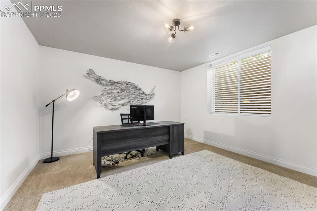 Image 43 of 50: Fifth bedroom of the home in the basement currently being used as a home of