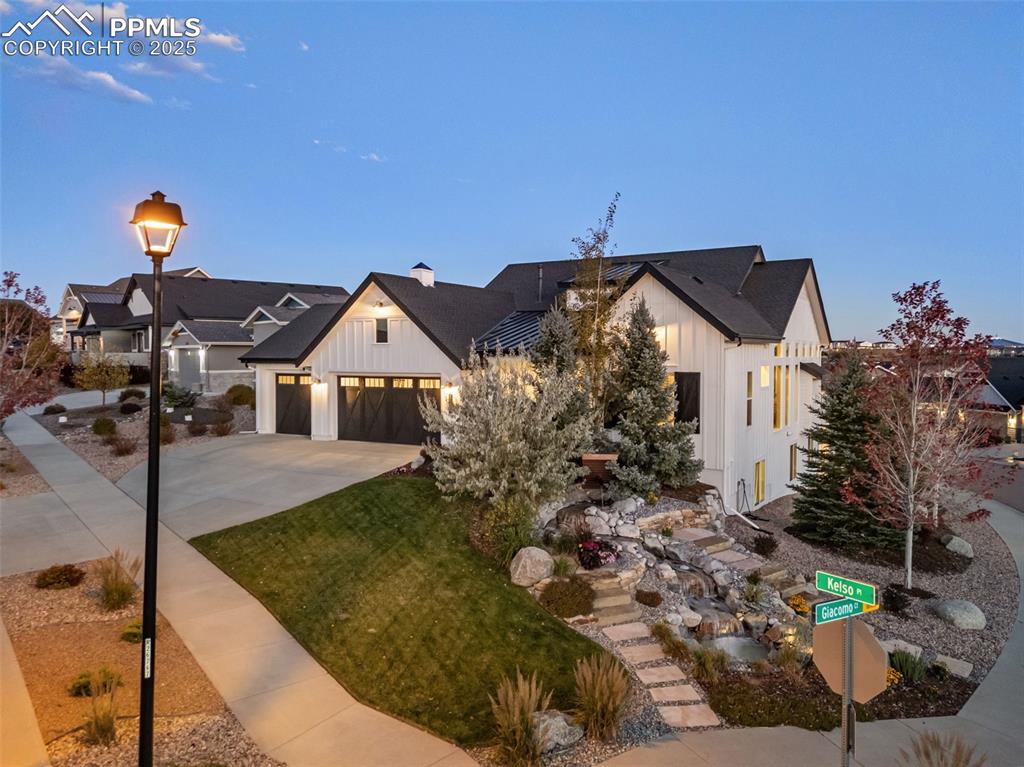 Image 47 of 50: This corner lot home is elevated to grant you privacy and stunning mountain
