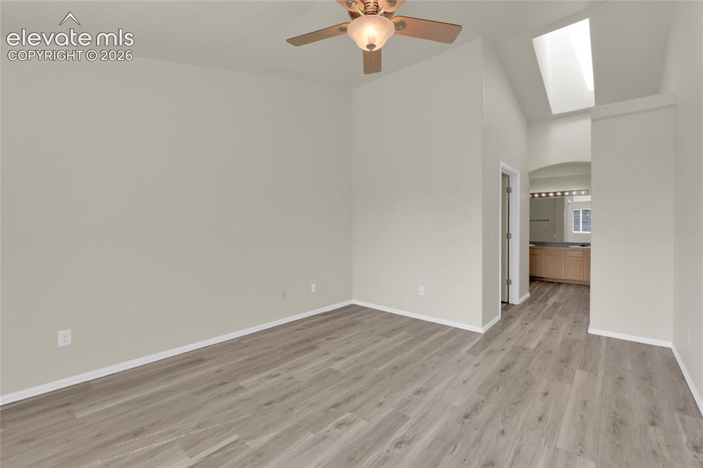 Image 14 of 30: Walk- in closet and bathroom entrance