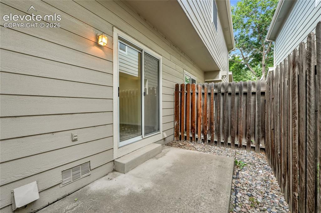 Image 22 of 30: Enclosed patio
