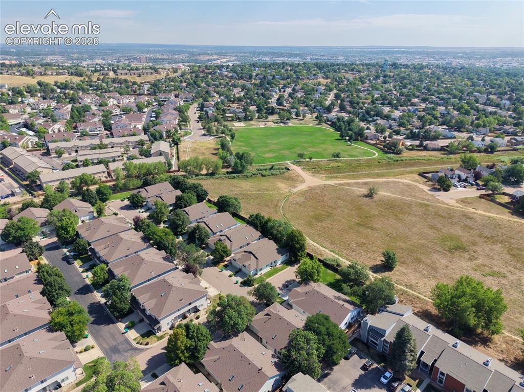 Image 5 of 30: open space behind the complex