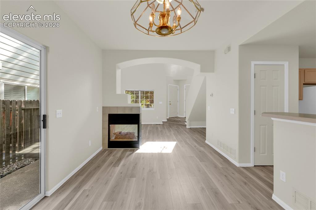 Image 6 of 30: View from the dining area and kitchen.