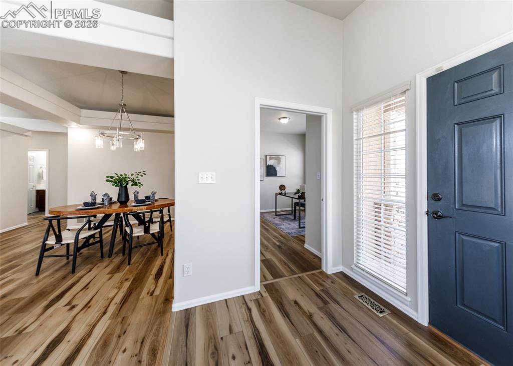 Image 3 of 39: Entry, office & dining room