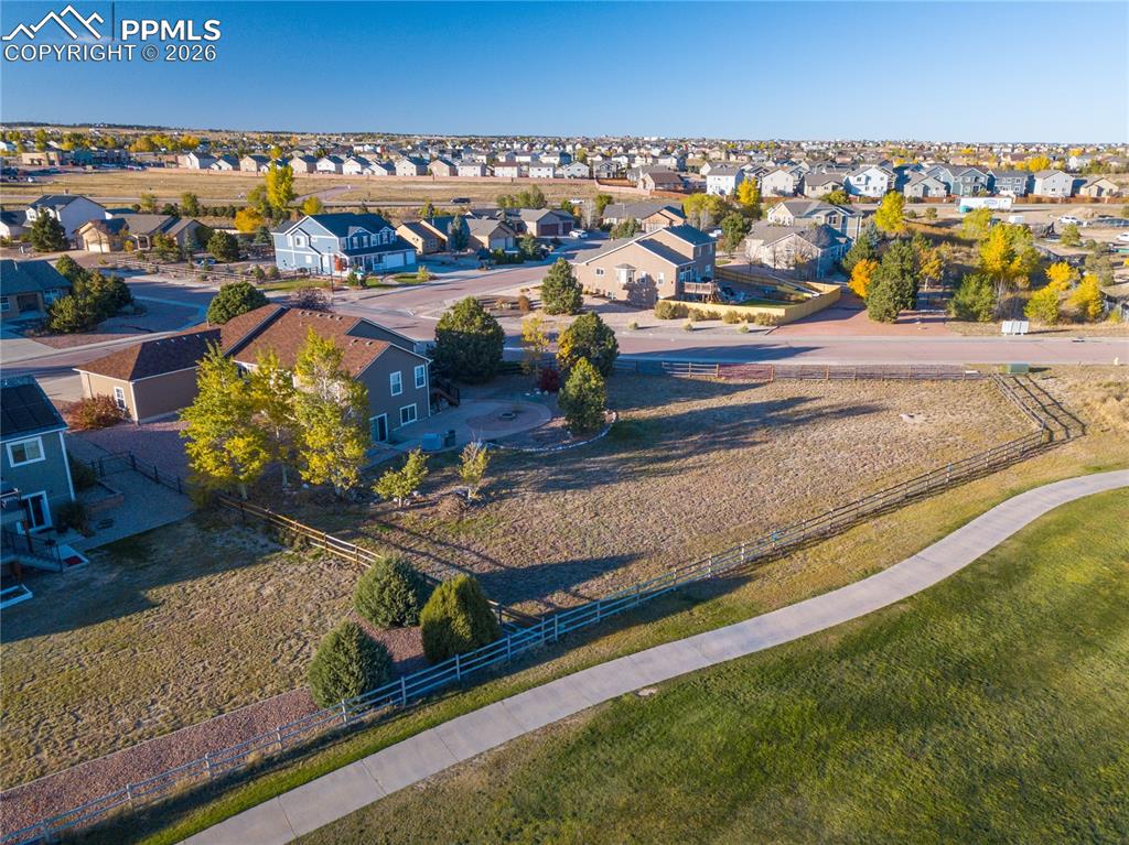 Image 48 of 50: Aerial view of home looking from the south featuring mountains and Antler C